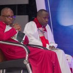 Archbishop elect CNC ONYELEDO inside in white with Bishop Vincent DIOLU.